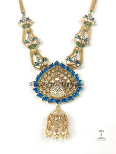 Premium high quality haar in 22Kt gold plating studded with silver foiled kundans. Tyaani inspired mala set with matching kundan jhumka. Comes with a unique blue Meenakari design, multilayered chains with matching motifs.  Extremely elegant necklace set with a gold plated dori chain. Light weight earrings. Kundan Mala, Chains Design, Kundan Jhumka, Pearl Mala, Rani Haar, Indian Necklace, Big Pearl, Kundan Necklaces, Elegant Necklace