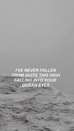 a black and white photo with the words i've never fallen from quite this high falling into your ocean eyes