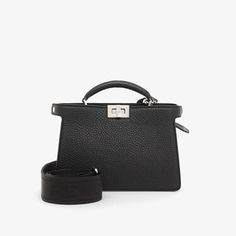 Iconic Peekaboo ISeeU XCross bag, made of black full-grain leather. The interior is organised into two compartments divided by a stiff partition, the front features the iconic twist lock, and there is a zip fastening on the back. Features a tone on tone leather lining, two compartments separated by a stiff partition, a contrasting-colour cardholder slot and palladium-finish metalware. Can be carried by hand or on the shoulder thanks to the handle and adjustable, detachable shoulder strap in webb Fendi Peekaboo Iseeu, Signature Rings, Fendi Peekaboo, Tone On Tone, Clutch Pouch, Black Leather Bags, Boston Bag, Ski Wear, Arm Candy