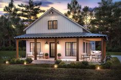 a small house is lit up at night