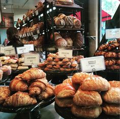 there are many different types of pastries on display