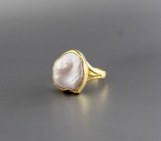 This Statement Rings item by ArtsysilverCrafts has 875 favorites from Etsy shoppers. Ships from India. Listed on Apr 19, 2023 Raw Pearl Ring, Chunky Pearl Ring, Elegant Hammered Stackable Rings For Gifts, Handmade Minimalist Pearl Ring For Wedding, Elegant Gold Nugget Ring, Minimalist Handmade Pearl Wedding Ring, Elegant Yellow Gold Nugget Rings, Pearl Ring Simple, Pearl Wedding Ring