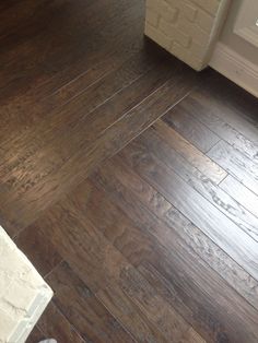 an image of a wood floor in the bathroom that needs to be cleaned or polished