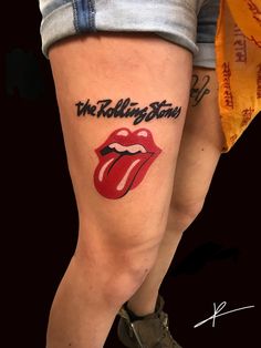 the rolling stones tattoo on someone's leg