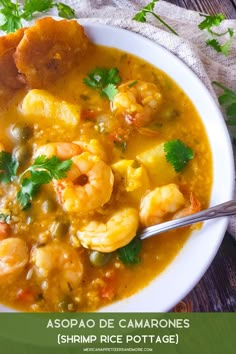 a white bowl filled with soup and shrimp