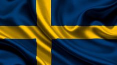 the flag of sweden is waving in the wind