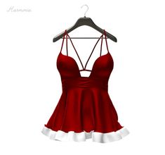 a women's red dress hanging on a hanger with white ruffles