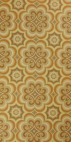 an orange and beige wallpaper pattern with swirls