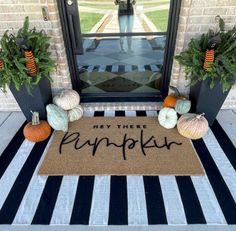 a welcome mat that says hey there pumpkin