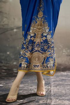 Blue silk kaftan with all over regal floral prints and narrow yellow panel work. - Aza Fashions Elegant Maxi Kaftan With Printed Motifs, Royal Blue Long Kaftan, Elegant Blue Kaftan With Dabka Details, Royal Blue Kaftan For Eid, Silk Kaftan With Dabka, Elegant Kaftan With Printed Motifs And Kimono Sleeves, Gold Kaftan With Dabka Detailing, Elegant Blue Floral Print Kaftan, Royal Blue Festive Kaftan