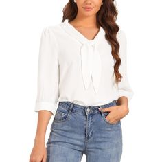 This Allegra K blouse is designed for the modern woman who values both style and comfort. Crafted from 100% polyester, it ensures durability and a soft touch against the skin. The blouse features a chic V-neck design complemented by a tie-neck, adding a touch of elegance to your outfit. Its 3/4 sleeves provide the perfect balance between coverage and style, making it ideal for transitional weather in spring and autumn. The loose fit not only offers comfort but also flatters various body types, m Business Casual Shirts, Women's Tie, Fitted Blouses, Women's Blouses, Tie Neck Blouse, Work Tops, Womens Tie, Loose Blouse, Work Blouse