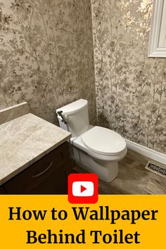 The words "How to Wallpaper Behind Toilet" sit below an image of gold wallpaper installed behind a toilet in a small bathroom Wallpaper Behind Toilet, Behind Toilet, Small Bathroom