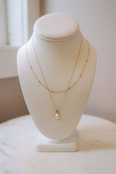 This necklace is a part of our ZPL- The Fine Line Collection and features a single pearl set in a 14K gold teardrop style pendant with several tiny diamonds placed in the pendant. 14K gold chain .13ct Pearl "18 in length Diamond Drop Necklace, Subtle Luxury, Single Pearl, Magnolia Pearl, Tiny Diamond, Pearl Set, Diamond Drops, Pearl Diamond, Fine Line