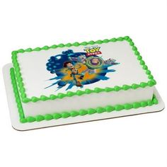 a birthday cake with the character toy story on it's frosting and green icing