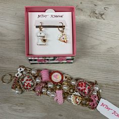 Betsey Johnson “Babycakes” Mixer Cluster Charm Wide Bracelet & Earrings Striking Multi-Row Curb Chain Link Statement Bracelet Featuring Vibrant Mixed Charms Including; Cherry Pie Slice, Oven Mitt, Croissant, Stand Mixer And Plaque Charms With Strawberry Motifs. Adorned With Stone Accents And Lustrous Pearls. Bracelet Has An Easy Toggle Closure. Made From Polished Metal, Glass, Faux Pearl And Plastic. Cluster Bracelet 7.5" L, 1.6" W Imported Matching Awesome Earrings / Mixer & Pie Authentic Product Ships Fast From A Smoke And Pet Free Home Cherry Pie Slice, Awesome Earrings, Pie Slice, Cluster Bracelet, Pearls Bracelet, Cluster Bracelets, Disney Day, Wide Bracelet, Stand Mixer