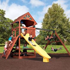 children playing on a wooden swing set