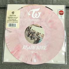 a pink record with the words ready to be on it's back and front cover