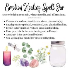 a jar with candles, flowers and other items in it that says emotion healing spell jar