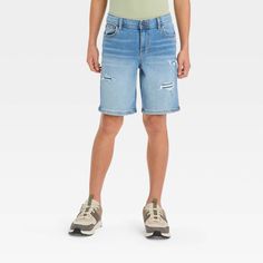 Update your child's casualwear for warmer days with these Destructed Denim Shorts from art class™. These mid-rise jean shorts made from stretchy denim fabric feature a destructed finish for a cool laid-back look. Falling above the knee, these regular-fit shorts are designed with a fly snap and zipper along with belt loops to help them find an adjustable secure fit, while front and back pockets lend functional flair. They can coordinate them with a variety of their tops for versatile wear options Boys Denim Shorts, Mid Rise Jean Shorts, Boys Denim, Fabric Tape, Pair Of Pants, Bottom Clothes, Art Class, Denim Fabric, Above The Knee