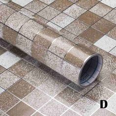 a close up of a tile floor with the word d on it and an image of a