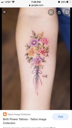 a flower tattoo is shown on the right arm and left leg, with flowers in it