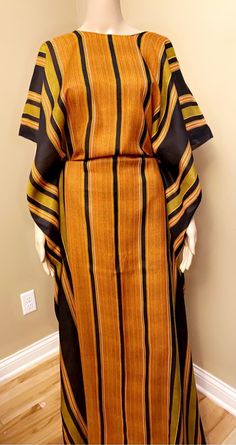 Brown Free Size Traditional Dress, Traditional Long Brown Dress, Traditional Brown Long Maxi Dress, Brown Tunic Dress One Size, Brown Tunic Dress In Free Size, Brown Free Size Tunic Dress, Brown Free Size Maxi Dress, Free Size Brown Maxi Dress, Baati Somali Dress