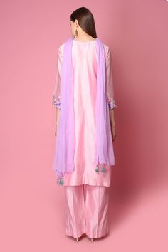 Pink straight long kurta with placement floral motif thread work and cutwork hem. Comes with pants and contrast tassel dupatta.
Component: 3
Embroidered
Neckine: V Neck
Sleeve Length: Three Quarter
Fabric: Kurta and Pant: Silk Chanderi; Dupatta: Chiffon
Color: Pink
Side slits
Tassel dupatta
Cutwork hem - Aza Fashions Diwali Organza Kurta With Embroidered Border, Organza Straight Kurta With Embroidered Border, Designer Organza Kurta With Embroidered Border, Unstitched Organza Kurta With Embroidered Border, Traditional Organza Kurta With Embroidered Border, Elegant Anarkali Set With Embroidered Border For Spring, Elegant Spring Anarkali Set With Embroidered Border, Spring Cotton Silk Dupatta With Embroidered Border, Designer Embroidered Border Sharara For Spring