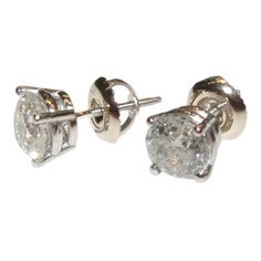 #HC12479 These gorgeous 3.01 CT, PLATINUM diamond studs are sure to amaze you. METAL SPECIFICATIONS Metal Name : PLATINUM STONE SPECIFICATIONS Stone Name : DIAMOND Stone Cut : Round Brilliant Stone Specifications : There are two diamonds of approx. 1.505 carats each. (approx. dia. 7.2 mm). Natural earth mined diamonds . Total Stone Weight : approx. 3.01 carats Color : F Clarity : VVS1 CAMERA'S FLASH is showing in picture however diamonds are clean Appraised Value : $38898.00 OPTIONS : - Total 1. Classic Sparkling Diamond Earrings For Formal Occasions, Classic Sparkling Diamond Earrings For Anniversary, Classic White Sparkling Diamond Earrings, Classic Sparkling Diamond White Earrings, Classic Sparkling White Diamond Earrings, Sparkling Round Cut Diamond Earrings For Anniversary, Sparkling Round Cut Diamond Earrings, Women Stud Earrings, White Gold Diamond Earrings