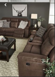 a living room with two couches and a coffee table