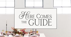 there is a sign that says here comes the guide on top of a dining table