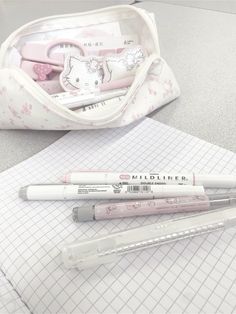 the contents of a hello kitty pencil case