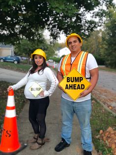 a man and woman dressed up as bump ahead