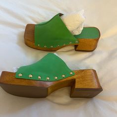 Clog Statement Shoes Perfect For Spring And Summer! Will Ship In Original Box With Duster Bag. Green Clogs With Removable Insole, Trendy Closed Toe Clogs With Removable Insole, Green Spring Clogs With Removable Insole, Green Open Toe Mules With Leather Sole, Green Heels With Wooden Heel For Spring, Spring Green Heels With Wooden Heel, Green Slip-on Mules With Removable Insole, Green Mules With Rubber Sole For Spring, Green Mules With Leather Sole And Round Toe