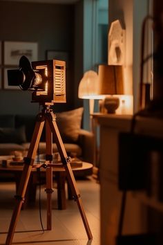 A wooden camera lamp on a stand, with a vintage look and feel, perfect for adding a touch of charm to any room. Camera Lamp, Wooden Camera, Vintage Vibe, Wooden Diy, Vintage Vibes, Rustic Charm, Perfect Place, Modern Style, With Love