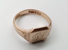 Vintage 9ct Gold Signet Ring.The gold has a lovely slight rose tint to it.Hallmarked London 1953, Makers Mark WWLtdCurrently has a monogram of SF engraved on the front. This can be left as it is or polished off and left plain. Please see example before and after image.  Size W (EU 63, US 11). Free Resizing Available - please message or email info@sobellejewellery.comWeight: 5.5gFront: 12mm x 10mmShoulders: 5mmBack: 3mmCondition:  Good, clean vintage condition. All items will have a full professi Fluorite Ring, Amethyst And Diamond Ring, Gold Signet Ring, Jewelry Style, Circle Studs, February Birth Stone, Chain Ring, Vintage Jewellery, Jewelry Gift Box