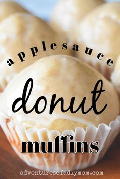 there are some muffins on the table with words above them that read, applesauce donut muffins