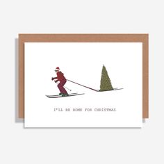 a christmas card with an image of a person on skis and the words i'll be home for christmas