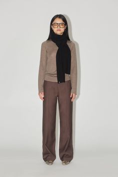 The Front Seam Trouser is a lustrous viscose twill mid rise trouser with a flat hook eye closure and belt loops. With a tailored fit, streamlined through the hip and leg, this trouser can easily take you through day to night. Thin Scarf, Day To Night, To Night, Cashmere Scarf, Hook Eye, Black And Brown, Mid Rise, Cashmere, Normcore