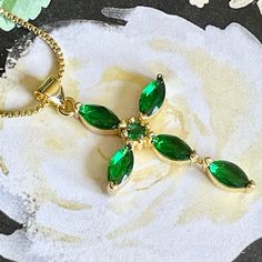 Brilliant Gold Tone Cross Pendant Necklace Sparkling Green Rhinestone Jeweled Cross on Gold Plated 18 Inch Chain Lobster Clasp Comes in Gift Box and Organza Gift Bag Ships within 3 days. Will ship first class mail.  See our shop Hello Emiko for more beautiful handmade jewelry and gifts. Green Rhinestone Necklace Gift, Green Rhinestone Jeweled Necklace For Gift, Green Rhinestone Necklace For Gift, Green Necklaces With Rhinestones As Gift, Cross Pendant Necklace, Organza Gift Bags, Cross Pendant, Gift Bag, Lobster Clasp