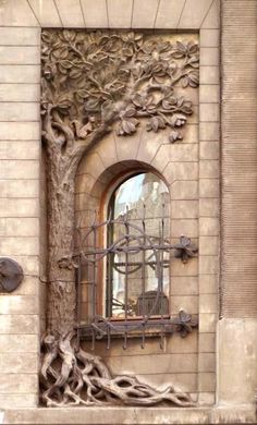 a window with iron bars on the side of a building