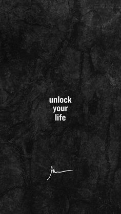 a black and white photo with the words unlock your life written in white on it