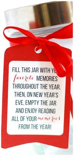 a jar with a red ribbon tied around it that says fill this jar with memories throughout the year