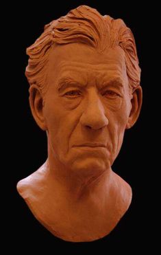 a clay sculpture of a man's face