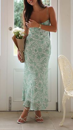 This green floral gathered maxi dress offers a dreamy, feminine look with its delicate leaf print and flattering open-back design. Featuring a side zipper and lined construction for a perfect fit, it’s the ultimate choice for elegant occasions. Green Floral Print Prom Dress, Green Maxi Dress With Floral Print For Garden Party, Green Maxi Dress For Garden Party, Floral Print Maxi Dress For Prom, Floor-length Green Maxi Dress With Floral Print, Green Floor-length Floral Maxi Dress, Green Floral Print Maxi Dress, Chic Green Floral Print Maxi Dress, Green Spring Maxi Dress For Prom