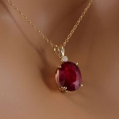 6.05ct Natural Red Ruby And Diamond 14k Solid Yellow Gold Necklace Amazing Looking Piece! Stamped: 14k Suggested Replacement Value: $1,500.00 Natural Oval Cut Ruby Weights: 6.00 Carats Ruby Measures: 12 X 10mm Total Natural Round Diamond Weights: 0.05 Carats (H / Si1) Total Chain Length Is 18 Inches Pendant Measures: 22.3 X 9.77mm Total Item Weight Is: 3 Grams Sku #706 Ruby Jewelry Necklaces Gold, Red Diamond Necklace, Red Stone Jewelry, Ruby Jewelry Necklaces, Red Stone Necklace, Ruby Necklace Pendant, Yule Ball, Ruby Pendant, Yellow Gold Necklace