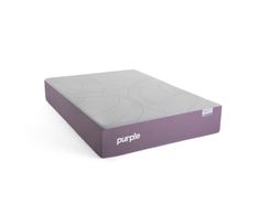 the purple mattress is shown on a white background