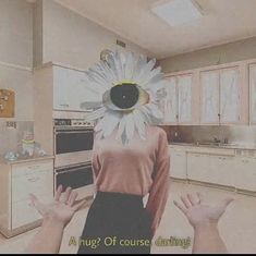 a woman standing in a kitchen with an eyeball on her head