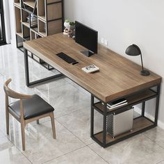 an office desk with a computer on it