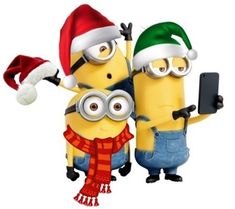 two minion characters wearing christmas hats and holding a cell phone in one hand while standing next to each other