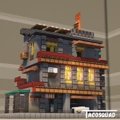 an image of a building made out of lego blocks and bricks with the words tacosquad on it